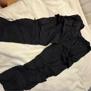 Edgy baggy fit hip hop tech wear black adjustable parachute pants